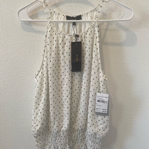 White shirt with rectangle designs